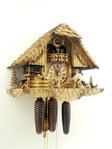 Black Forest house with woodchopper and animals